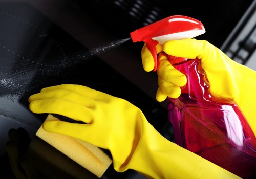 Cleaning professional assessing carpet fibres and service requirements before treatment
